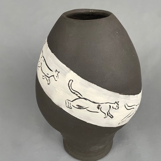 Diagonal cat-in-motion dark vase