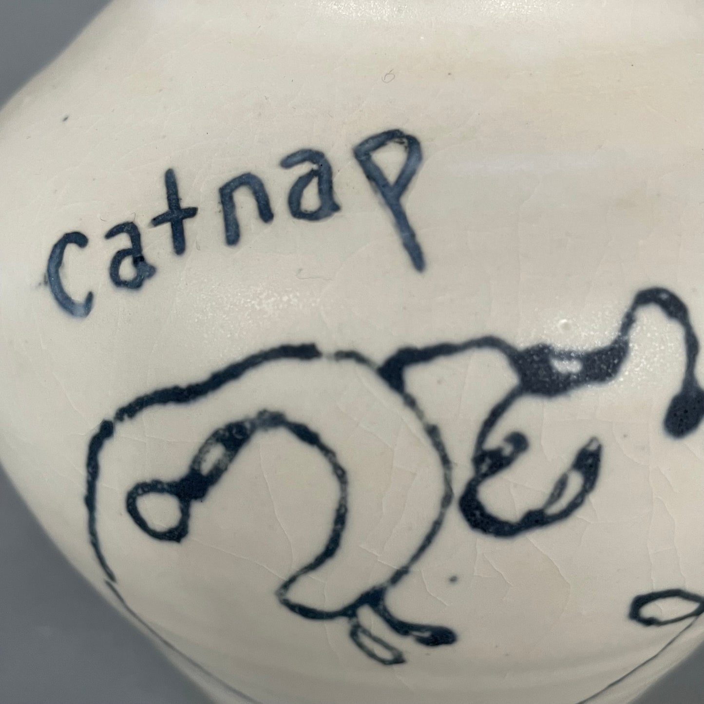 Blue catnap cat outline vase